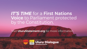 Image of Uluru against a sunset. Text reads 'It's time for a First Nations Voice to Parliament protected by the Constitution. Visit UluruStatement.org. for more information.